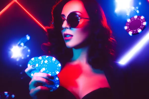 A player using their smartphone during a festive local event, representing 366BET’s fully mobile-friendly casino.