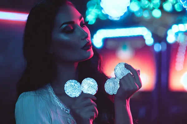 A person using their device against a moody casino-themed background, illustrating the smooth re-entry process at 366BET.